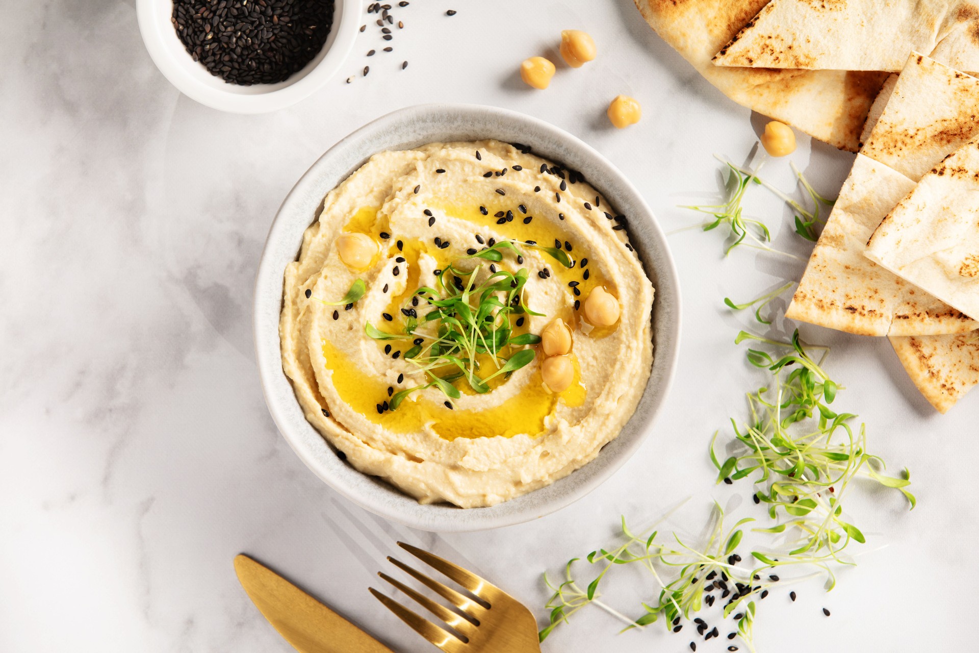 Creamy Hummus with Pita Bread and Black Sesame Seeds