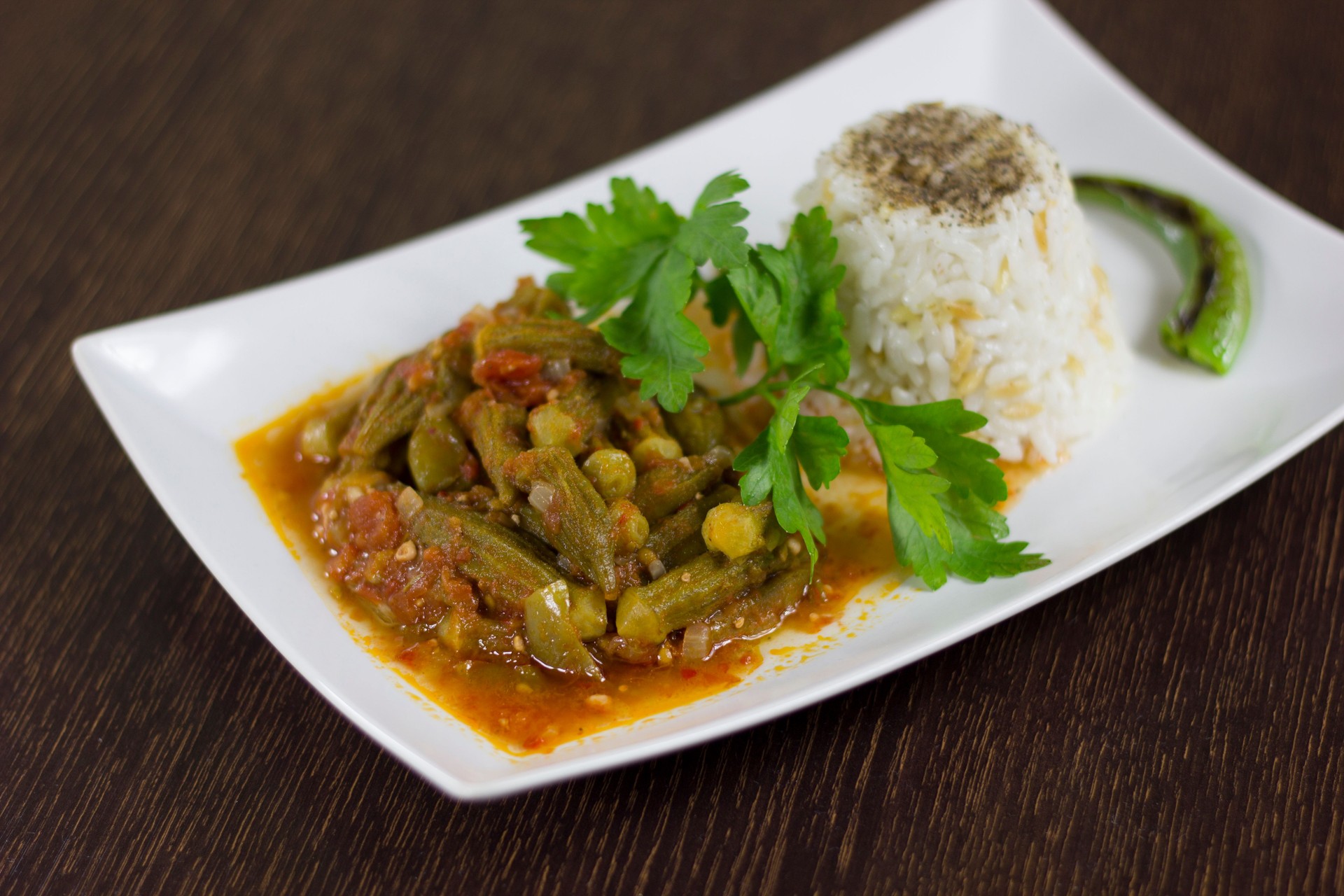 Stewed okra with rice close up